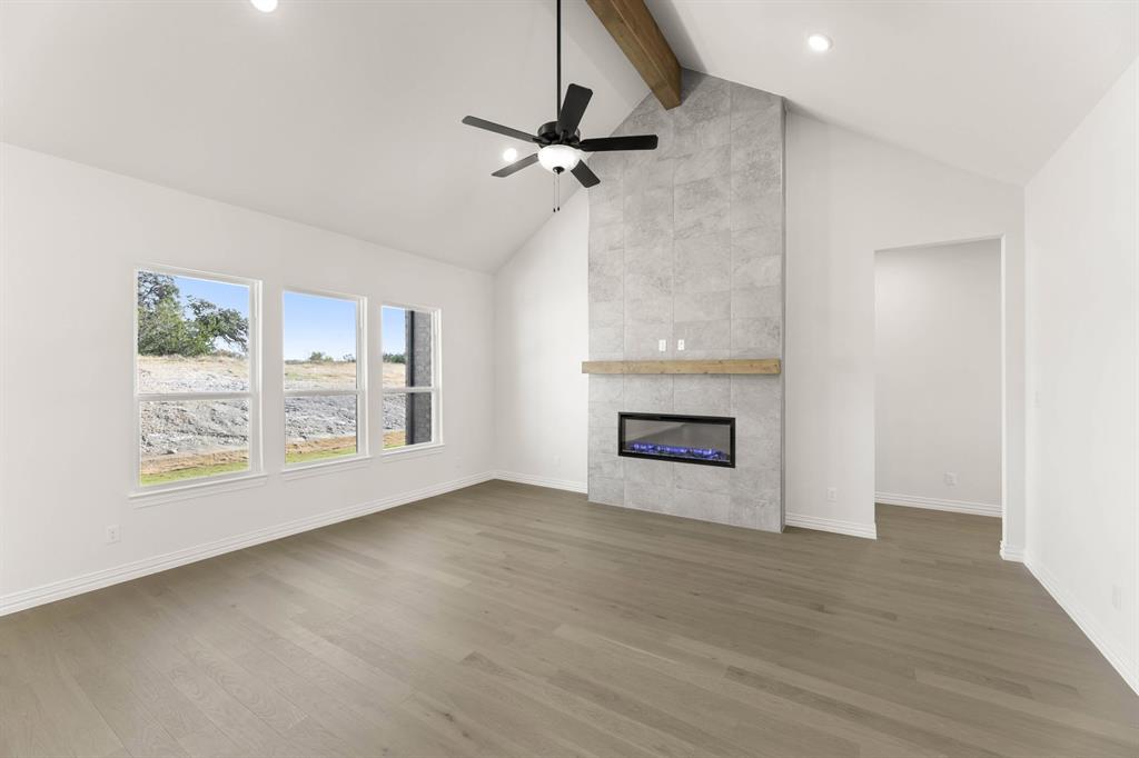 317 Slimp Bluff Azle, TX 76020 - Photo 4 of 25 a view of an empty room with a window