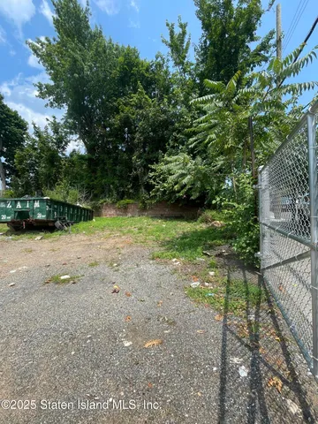 a view of backyard with green space