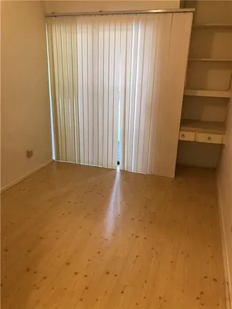 a view of a room with a door