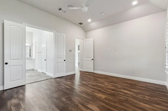 a bathroom with a double vanity sink and mirror