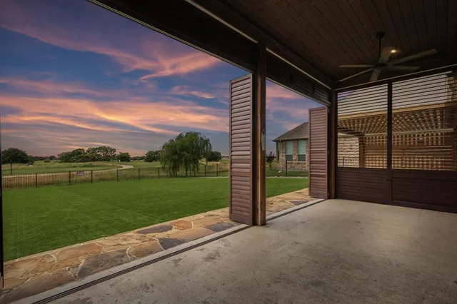 a view of a porch and garden