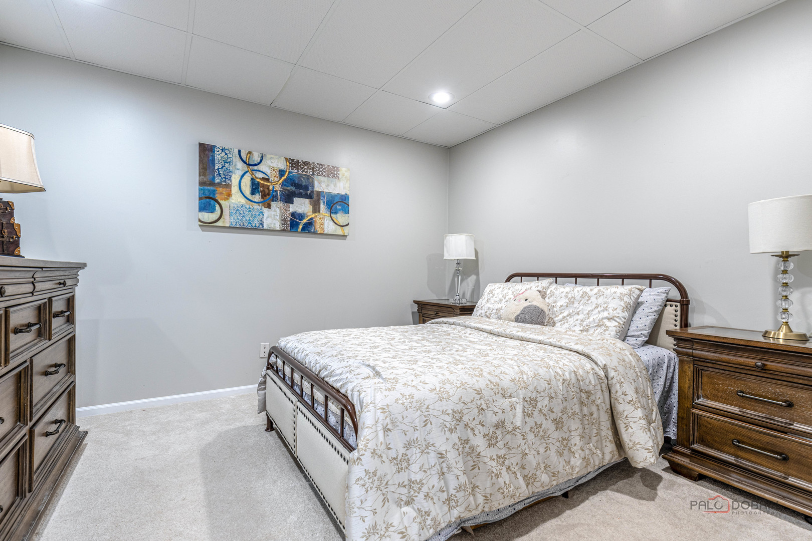2627 Rutland Road Naperville, IL 60564 - Photo 25 of 38 a bedroom with a bed and a night stand