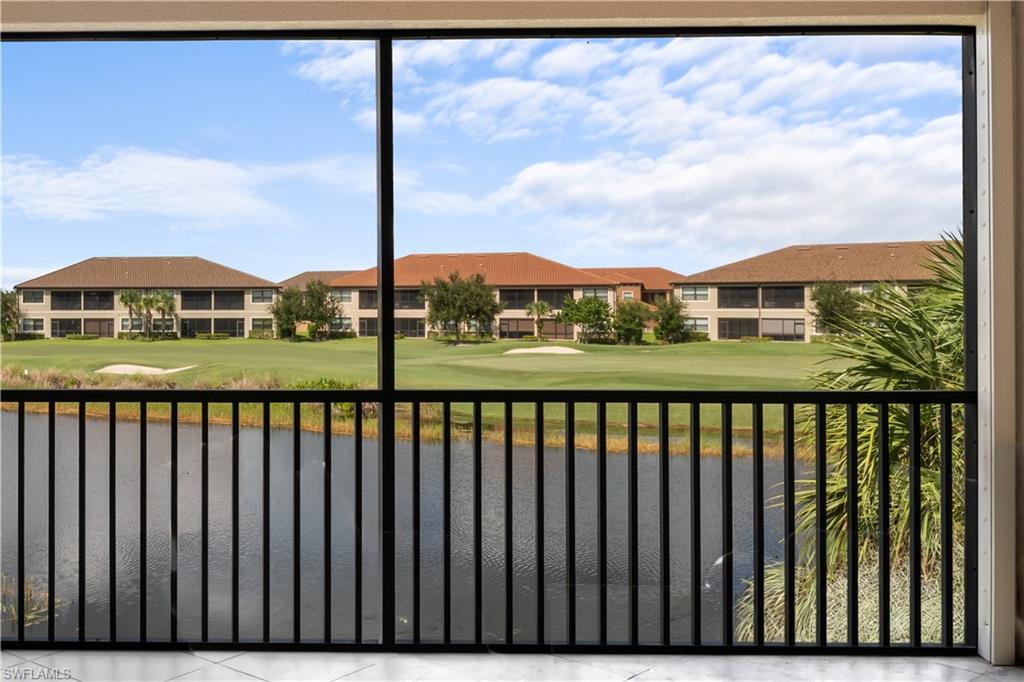9658 Montelanico Loop, Unit 201 Naples, FL 34119 - Photo 24 of 46 a view of city from a balcony