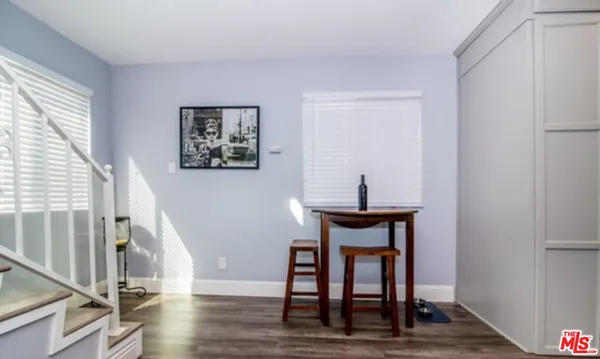 a room with furniture and a window