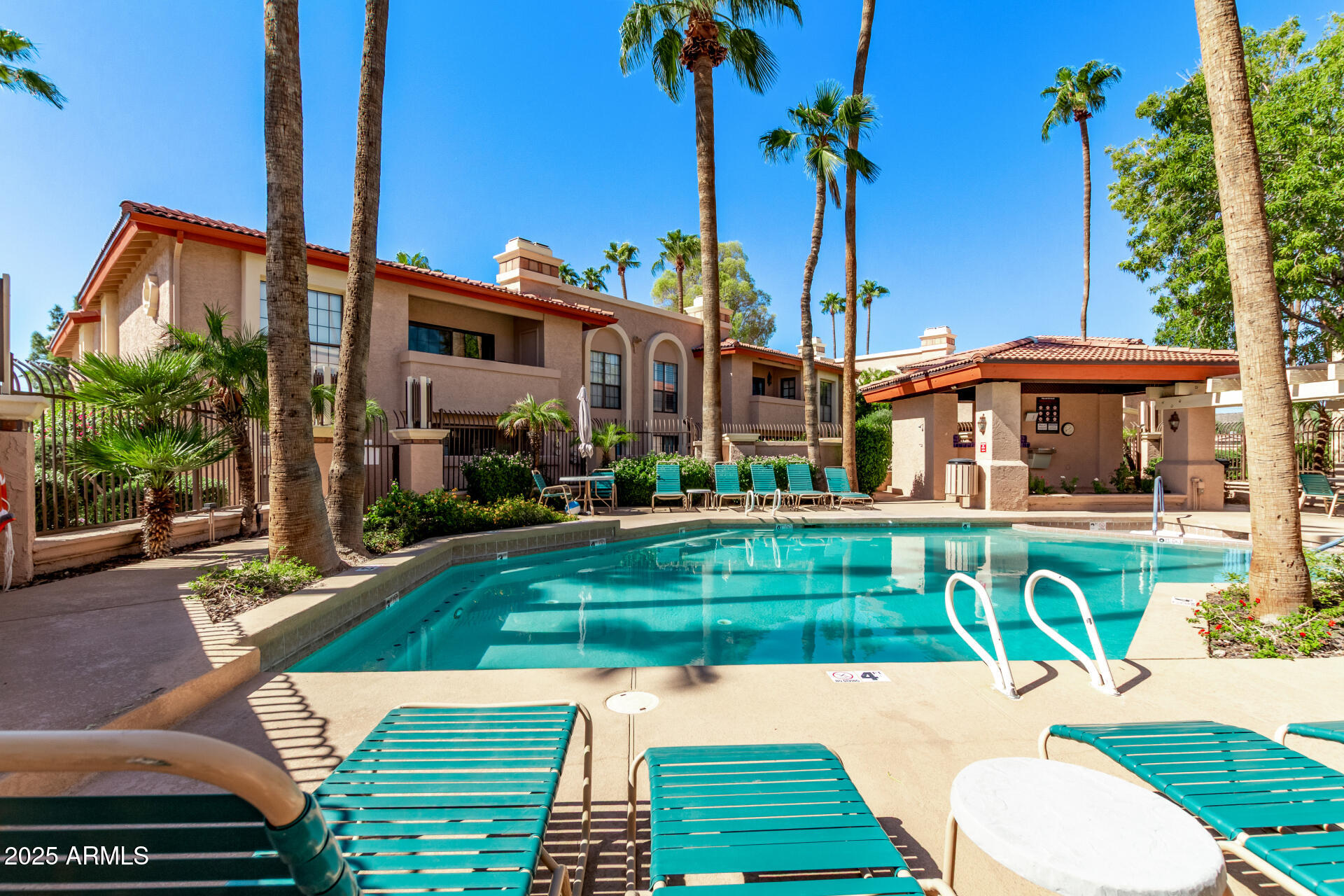 10410 North Cave Creek Road, Unit 1230 Phoenix, AZ 85020 - Photo 7 of 13 a view of a house with a yard