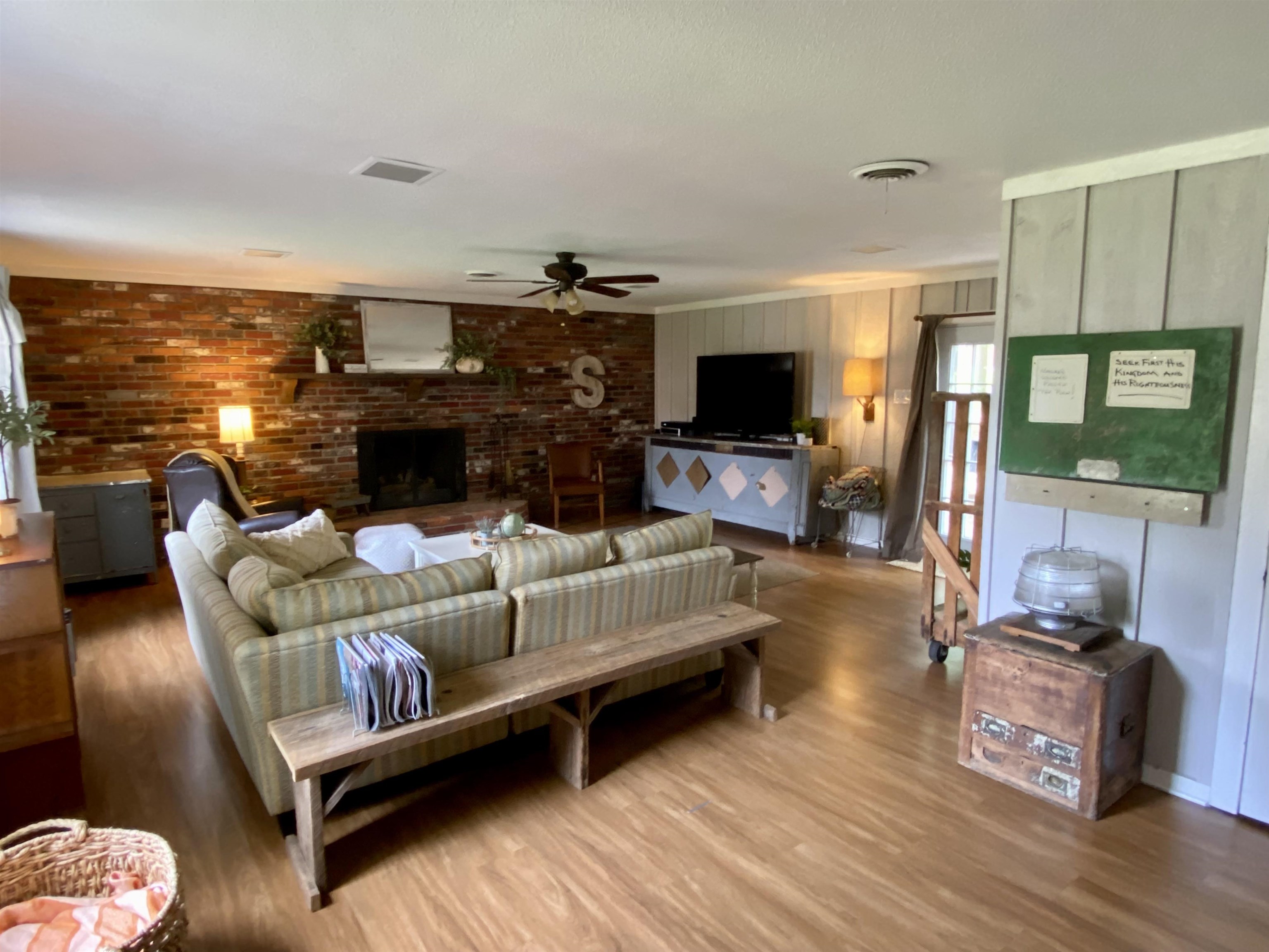 479 Burley Road Collierville, TN 38017 - Photo 3 of 22 a living room with furniture and a flat screen tv