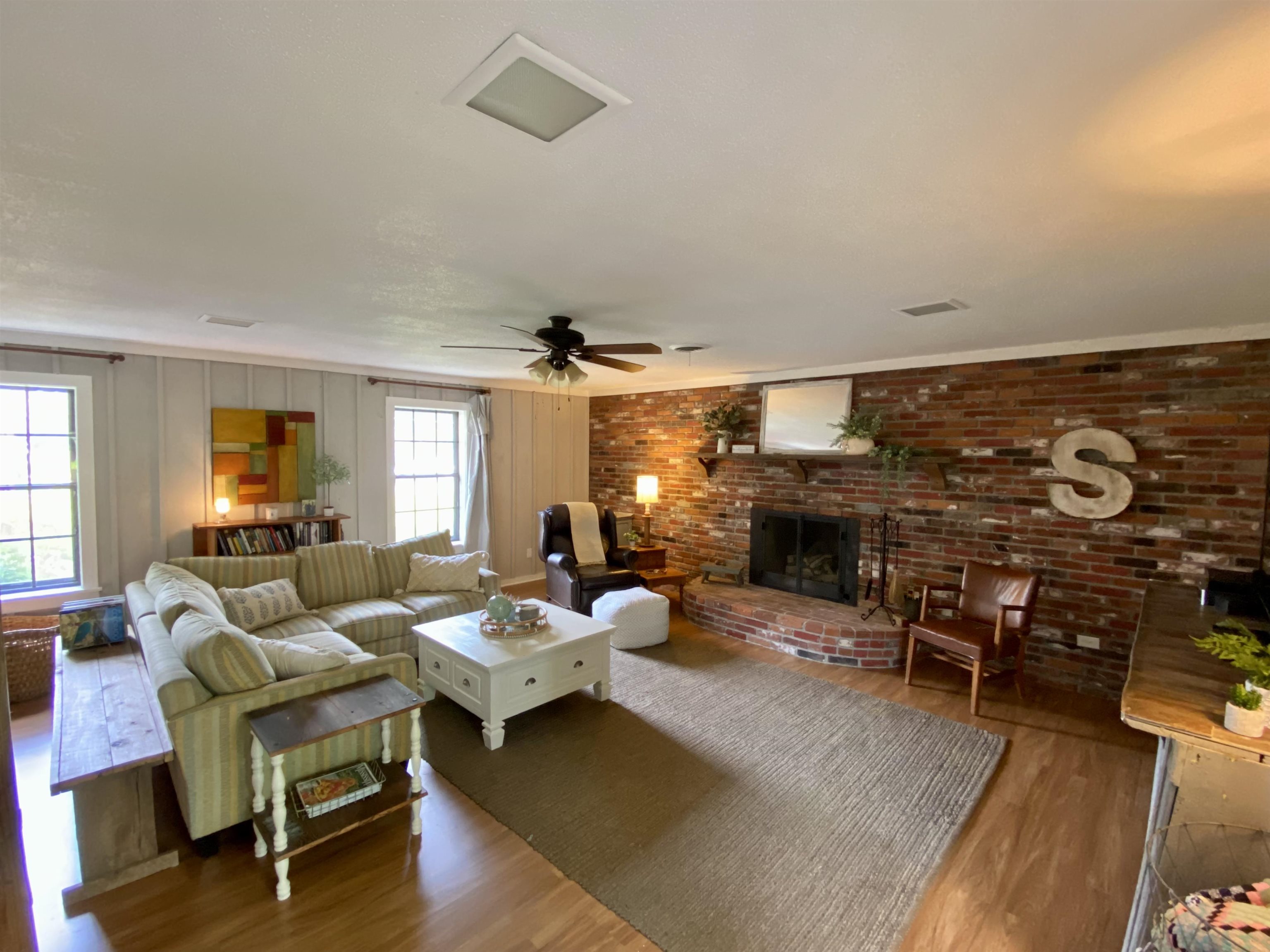 479 Burley Road Collierville, TN 38017 - Photo 5 of 22 a living room with furniture and a fireplace
