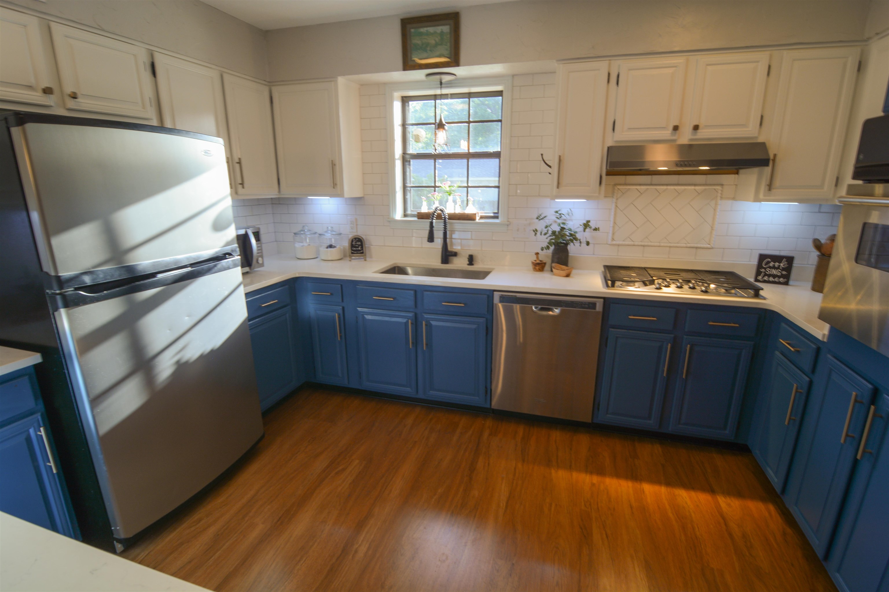 479 Burley Road Collierville, TN 38017 - Photo 8 of 22 a kitchen with stainless steel appliances a sink a stove a refrigerator and cabinets