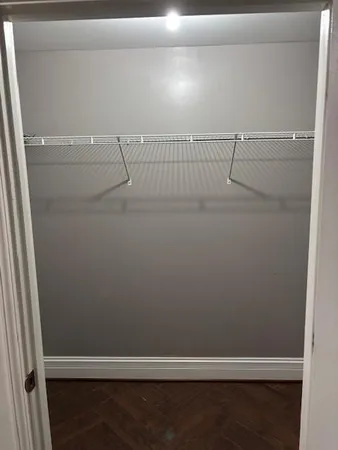 a view of a room with racks on the wall