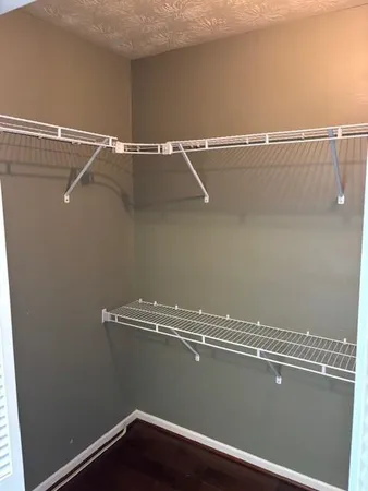 a view of a room with racks on the wall