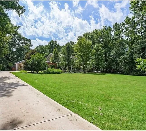a view of building with garden
