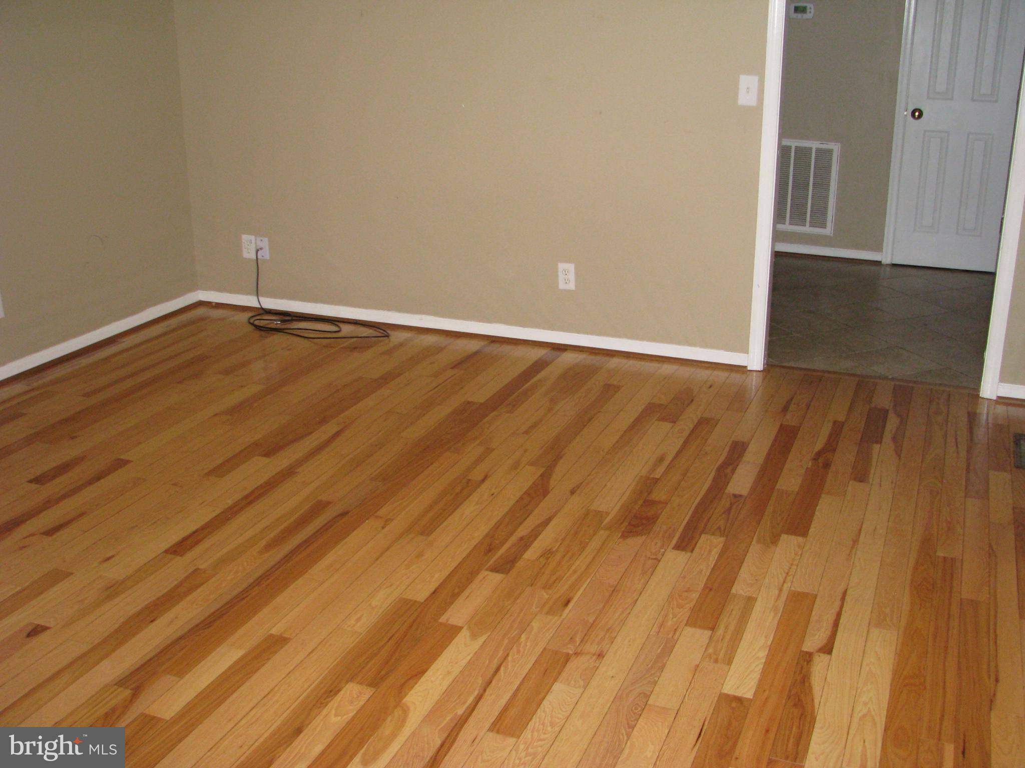 28434 Walnut Ridge Way Rhoadesville, VA 22542 - Photo 11 of 37 Hardwood Floors in the main living area