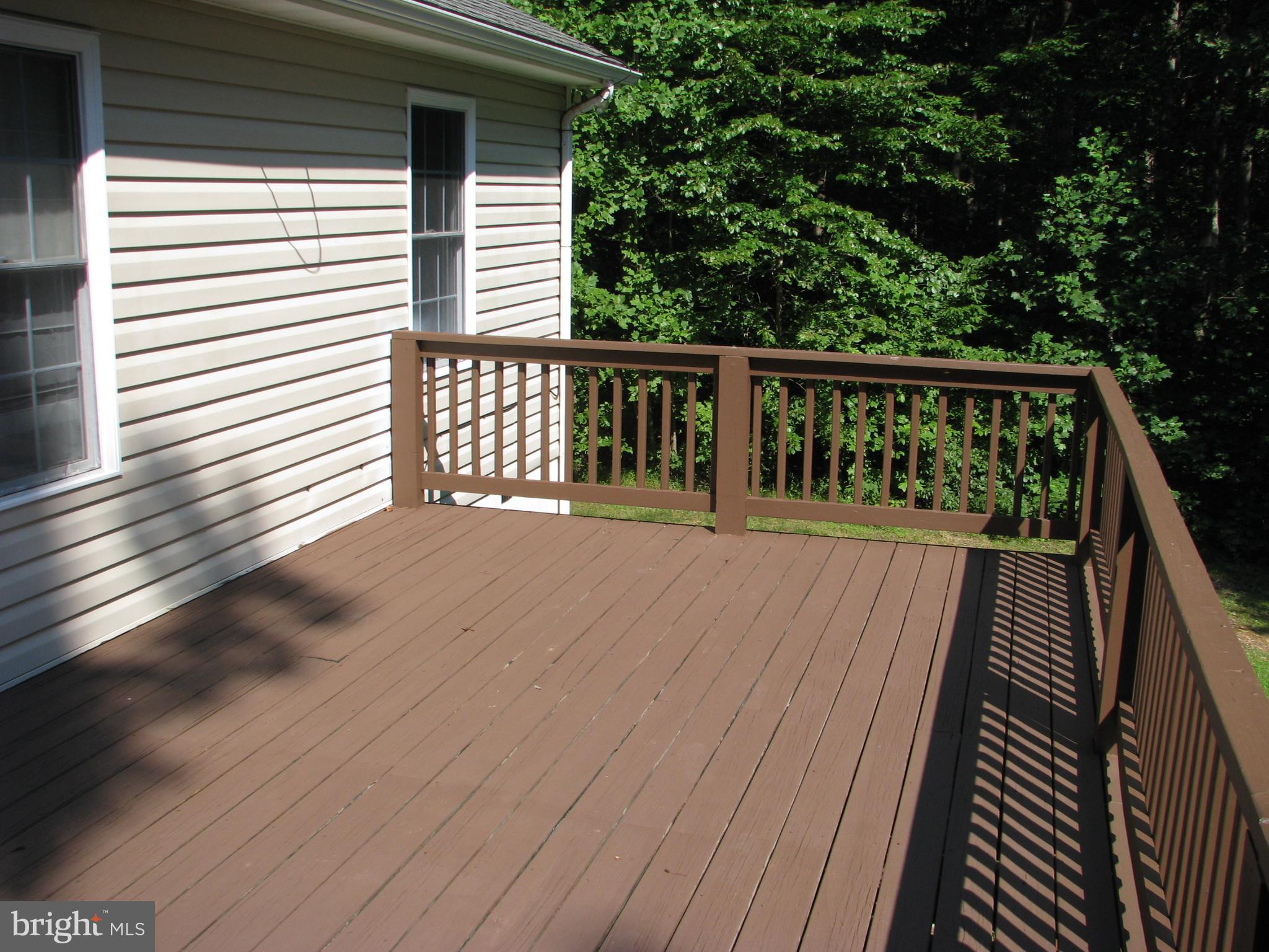 28434 Walnut Ridge Way Rhoadesville, VA 22542 - Photo 26 of 37 Re-stained deck off Dining Area