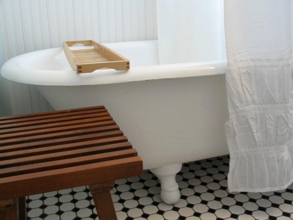 77 Academy Street Bath, ME 04530 - Photo 31 of 35 Footed tub and detail view of tile...
