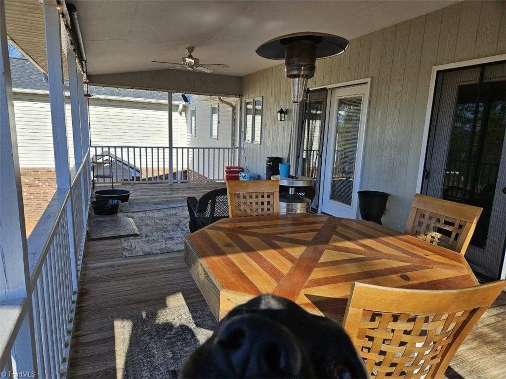 1565 Old Rockford Road Dobson, NC 27017 - Photo 11 of 50 Large covered deck off dining area
