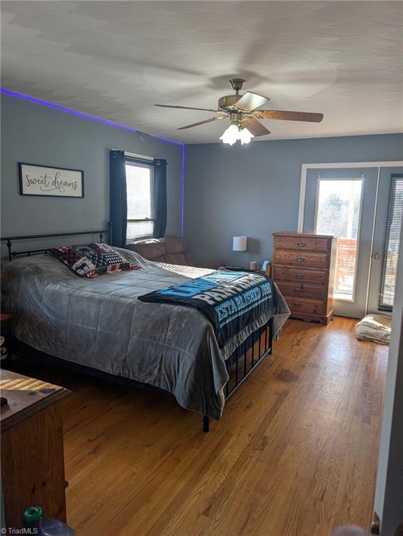 1565 Old Rockford Road Dobson, NC 27017 - Photo 16 of 50 Primary bedroom with entrance to the deck!