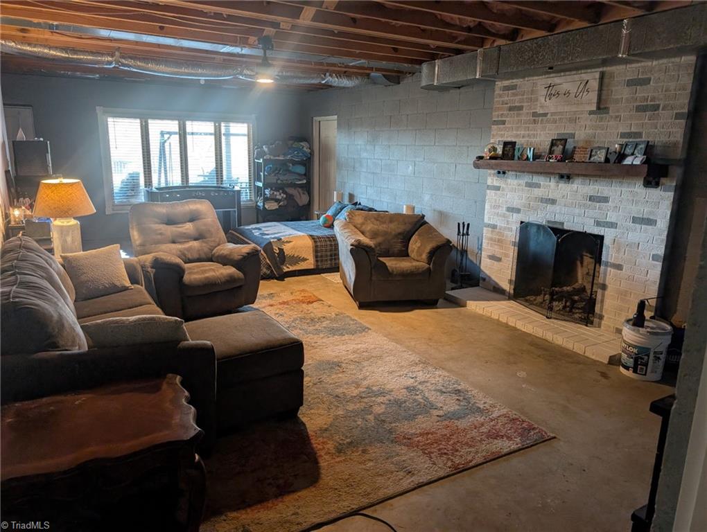 1565 Old Rockford Road Dobson, NC 27017 - Photo 48 of 48 Basement fireplace