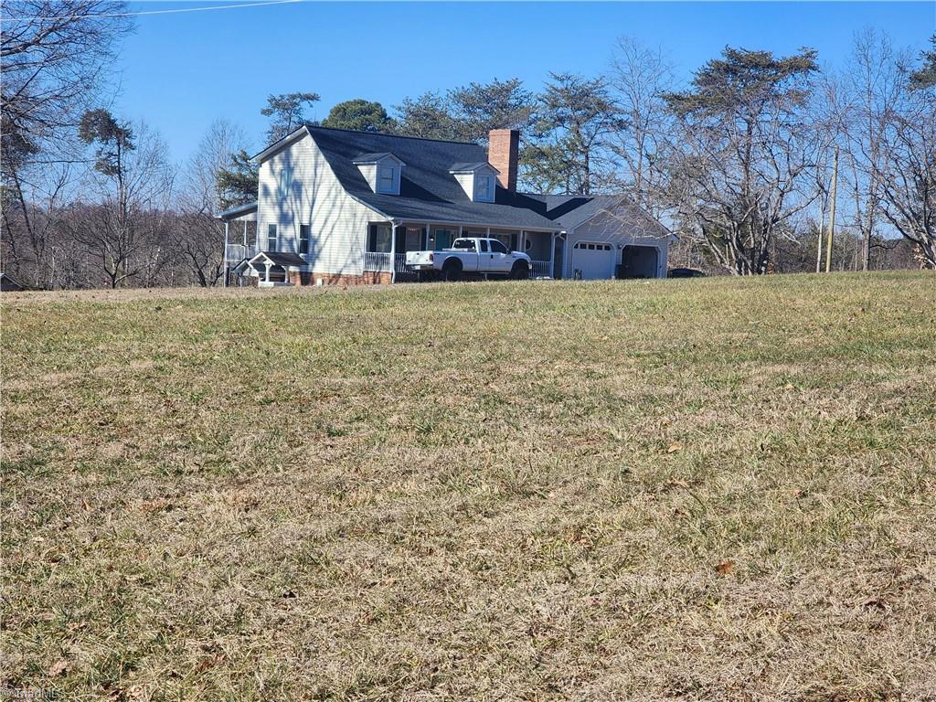 1565 Old Rockford Road Dobson, NC 27017 - Photo 5 of 50 Home sits back off the road
