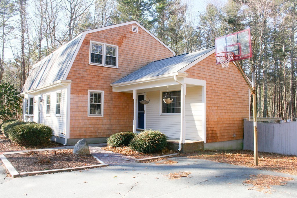 9 Bennett Road Rochester, MA 02770 - Photo 5 of 29 a front view of a house with street