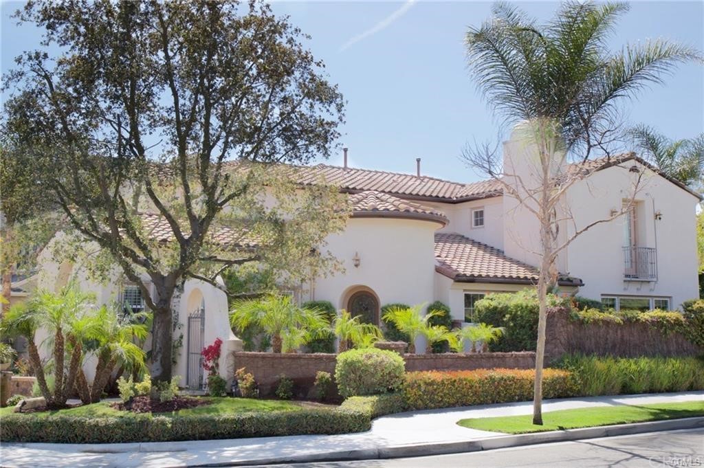 2 Illuminata Lane Ladera Ranch, CA 92694 - Photo 1 of 1 a front view of a house with garden