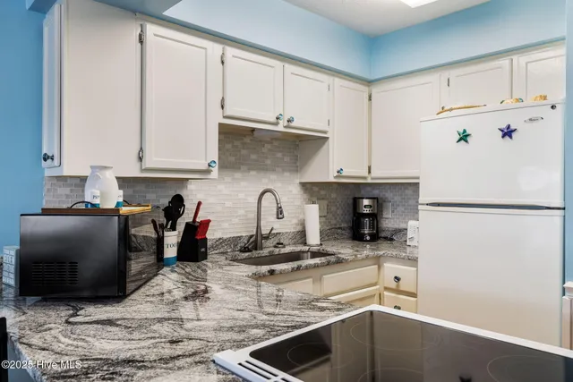 $419,900 | 1311 Lake Park Boulevard South, Unit 2B, Carolina Beach, NC 28428