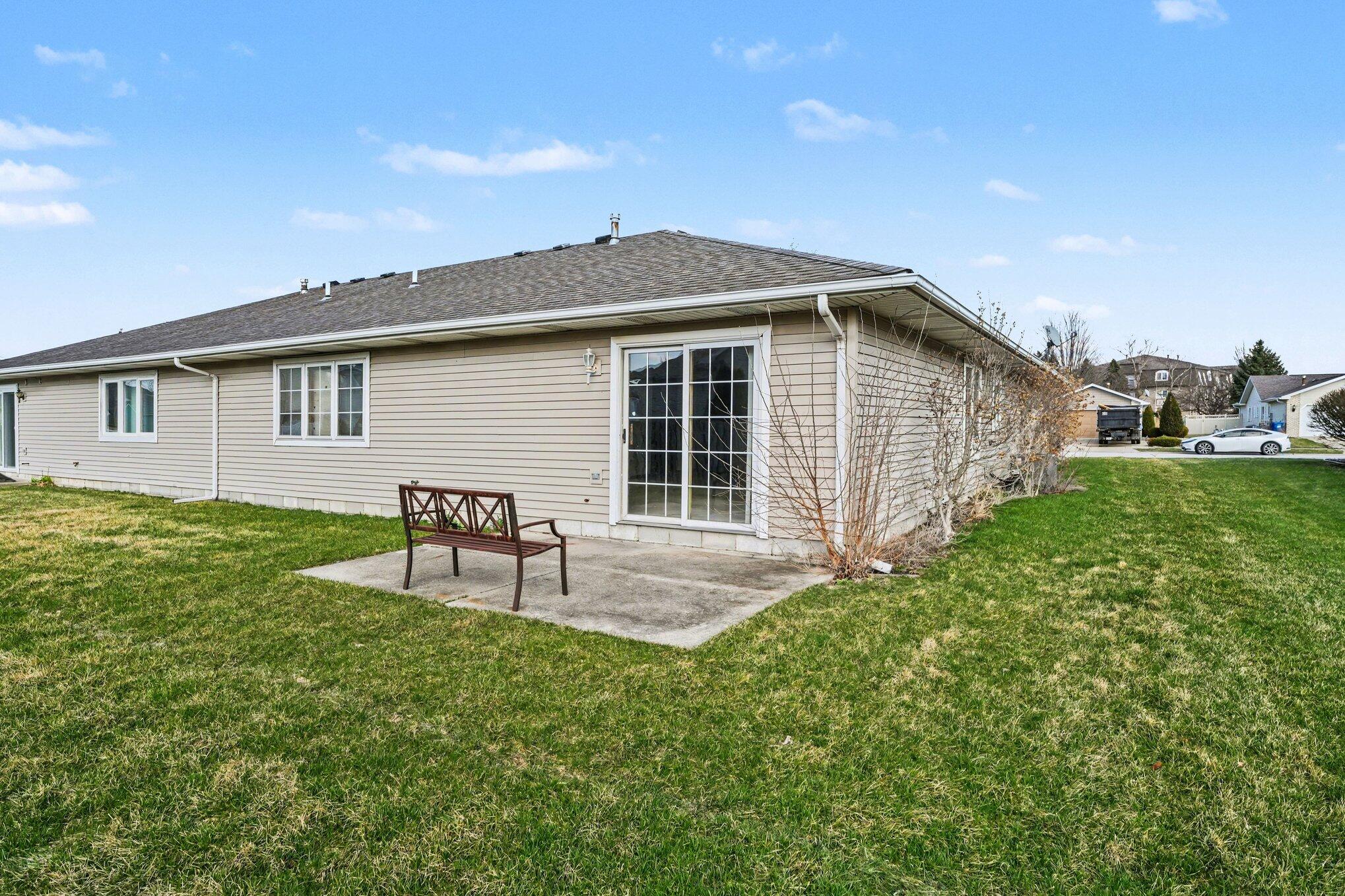 950 Blue Jay Way Dyer, IN 46311 - Photo 3 of 21 a house view with a garden space