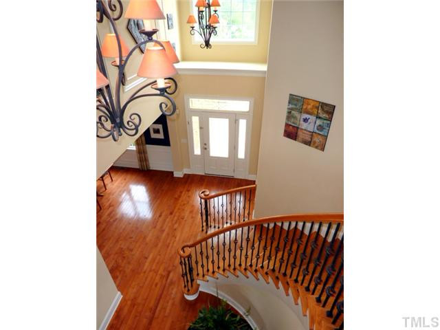 12301 Bunchgrass Lane Raleigh, NC 27614 - Photo 11 of 19 View the beautiful foyer from the top of the stairs. Your family and guests will love walking through the door! Foyer
