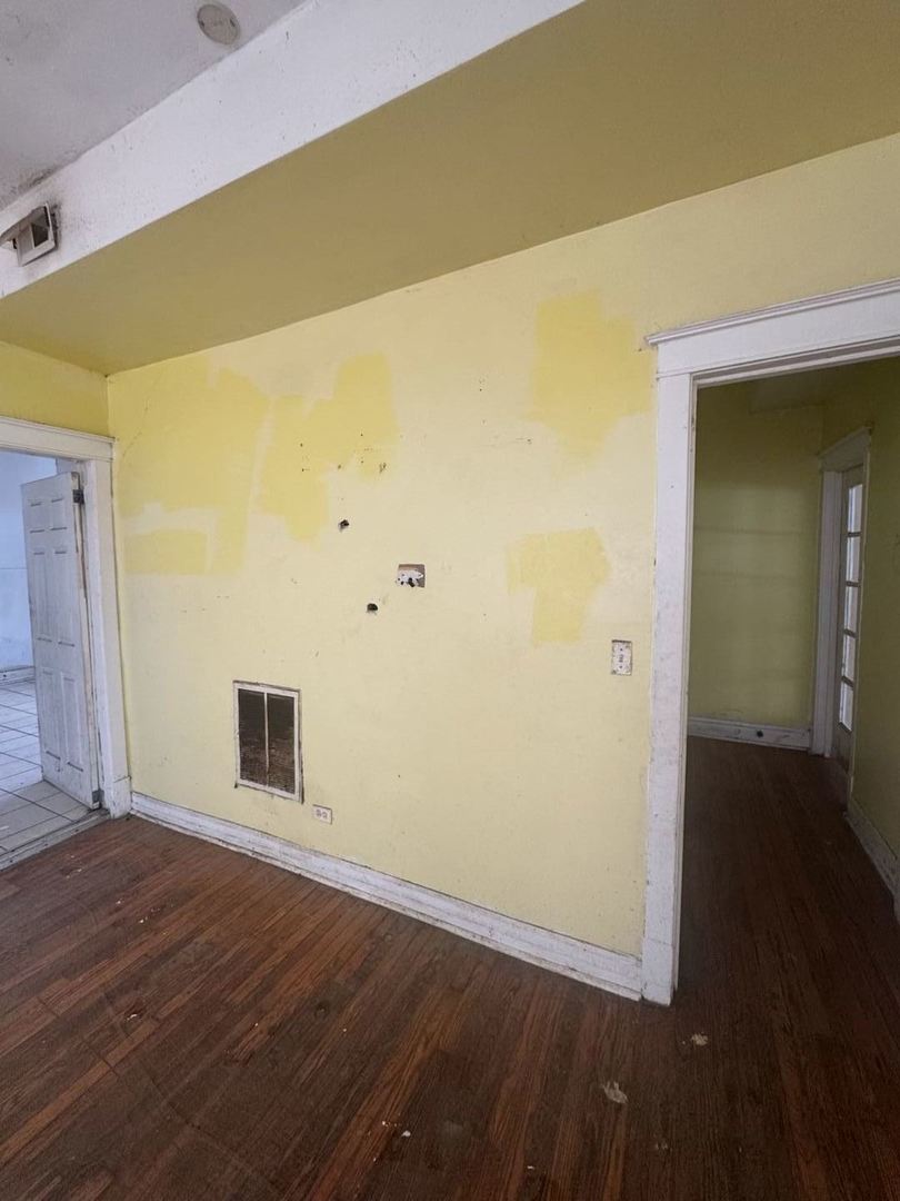 7007 South Ada Street Chicago, IL 60636 - Photo 18 of 49 wooden floor in an empty room