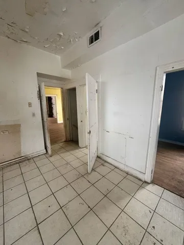 an empty room with a door