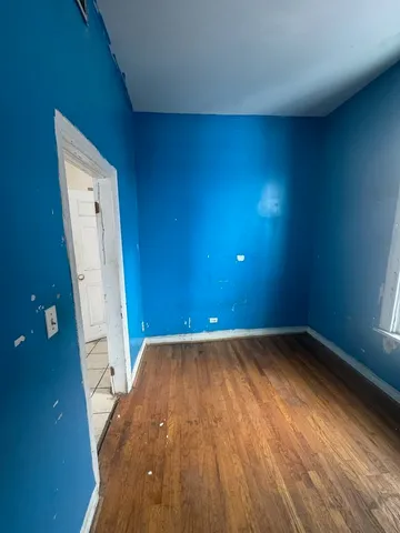 a view of kitchen with a sink a counter top space cabinets and stainless steel appliances