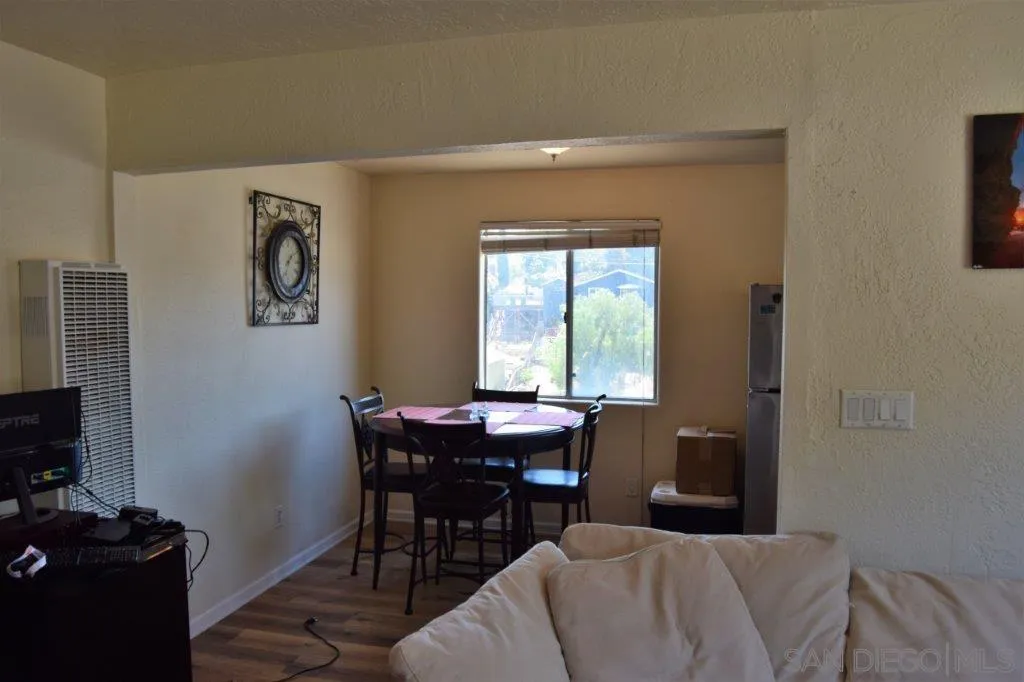 3159-3161 Cedar Street San Diego, CA 92102 - Photo 11 of 39 a view of a workspace with furniture and a window