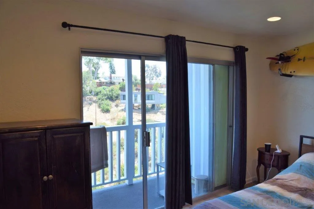 3159-3161 Cedar Street San Diego, CA 92102 - Photo 13 of 39 a view of a bedroom from the hallway