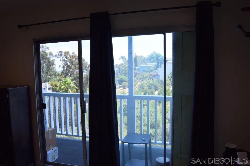 3159-3161 Cedar Street San Diego, CA 92102 - Photo 14 of 39 a view of a large window with an outdoor space