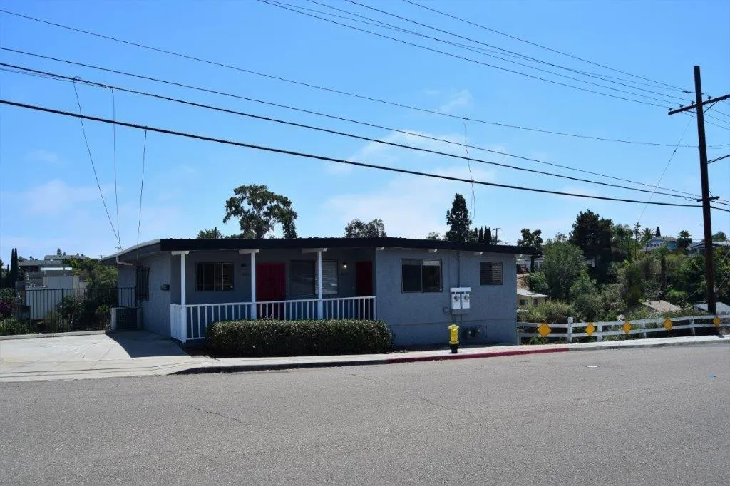3159-3161 Cedar Street San Diego, CA 92102 - Photo 2 of 39 a view of a street with a car parked in front of it