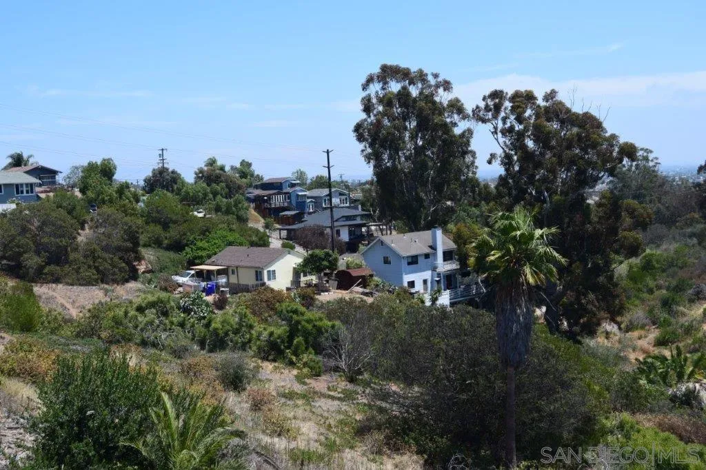 3159-3161 Cedar Street San Diego, CA 92102 - Photo 21 of 39 a view of a house with a street park