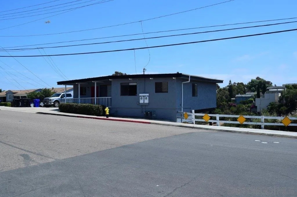 3159-3161 Cedar Street San Diego, CA 92102 - Photo 3 of 39 a car parked on the side of the road