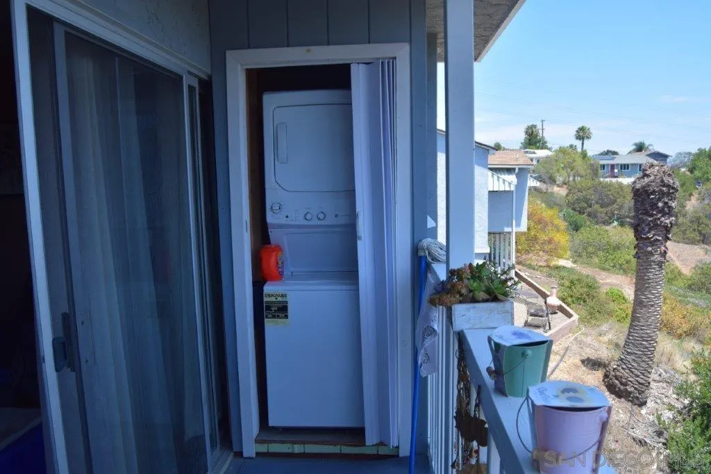 3159-3161 Cedar Street San Diego, CA 92102 - Photo 36 of 39 a room with furniture and a potted plant