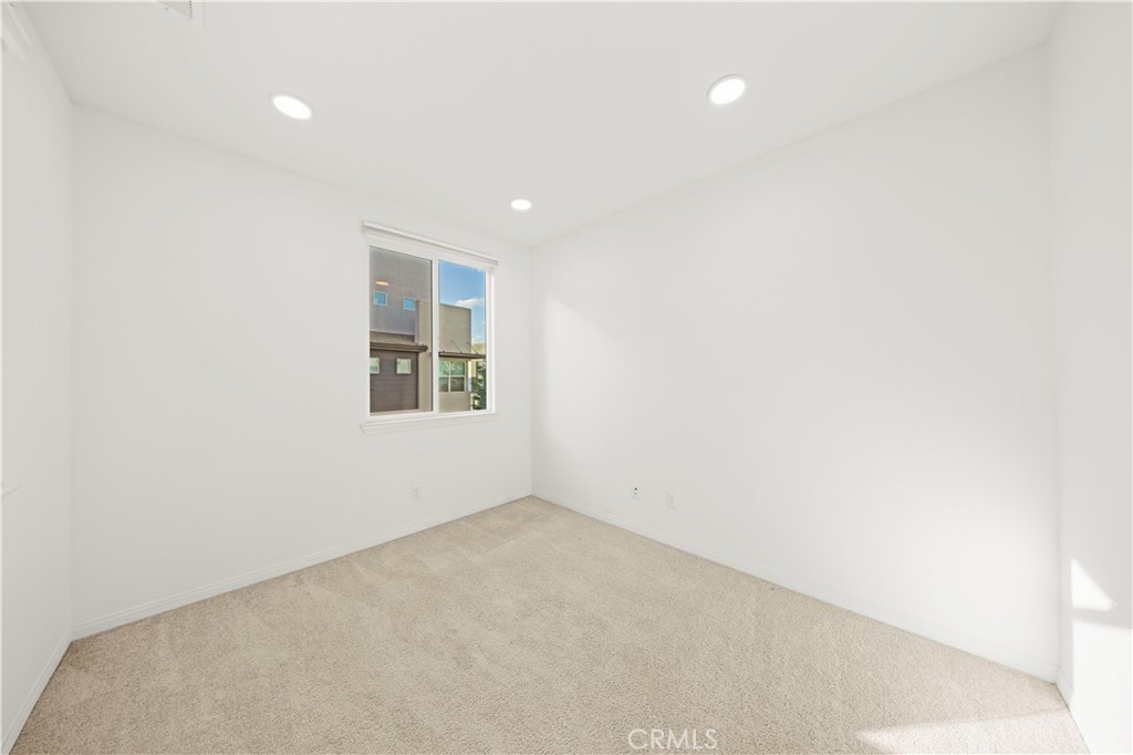 7803 Paxton Place Rancho Cucamonga, CA 91730 - Photo 20 of 44 an empty room with windows