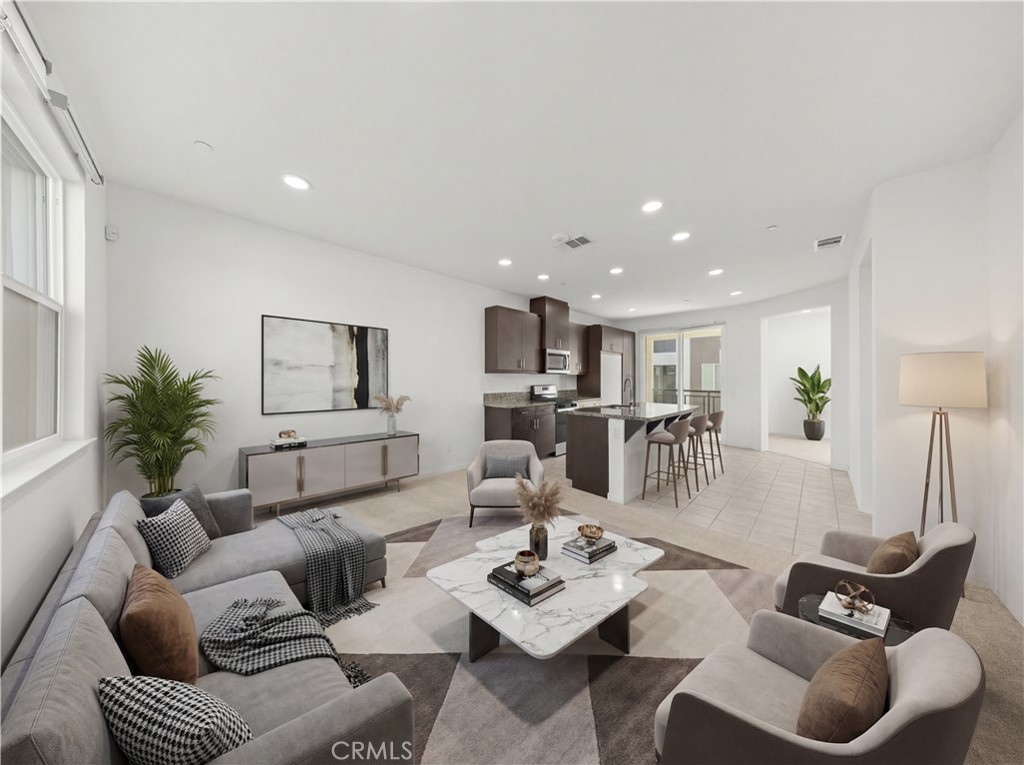 7803 Paxton Place Rancho Cucamonga, CA 91730 - Photo 3 of 44 a living room with furniture and a table