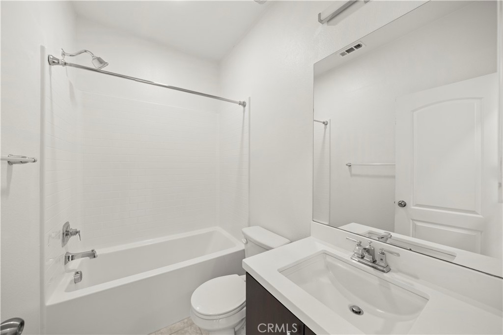 7803 Paxton Place Rancho Cucamonga, CA 91730 - Photo 32 of 44 a bathroom with a sink toilet and shower