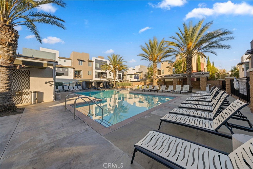 7803 Paxton Place Rancho Cucamonga, CA 91730 - Photo 37 of 44 a view of a patio with swimming pool and sitting area