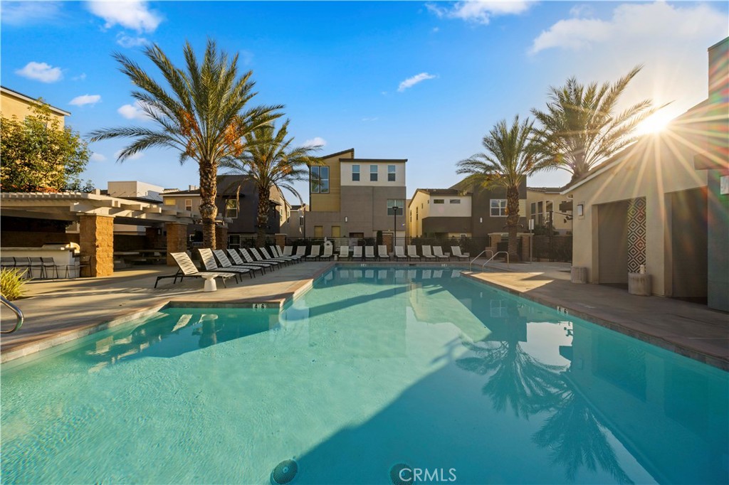 7803 Paxton Place Rancho Cucamonga, CA 91730 - Photo 39 of 44 a swimming pool with outdoor seating and yard