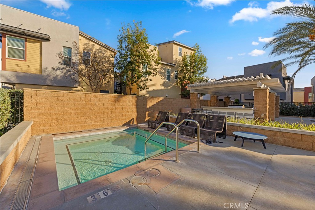 7803 Paxton Place Rancho Cucamonga, CA 91730 - Photo 40 of 44 a view of a patio with a table and chairs