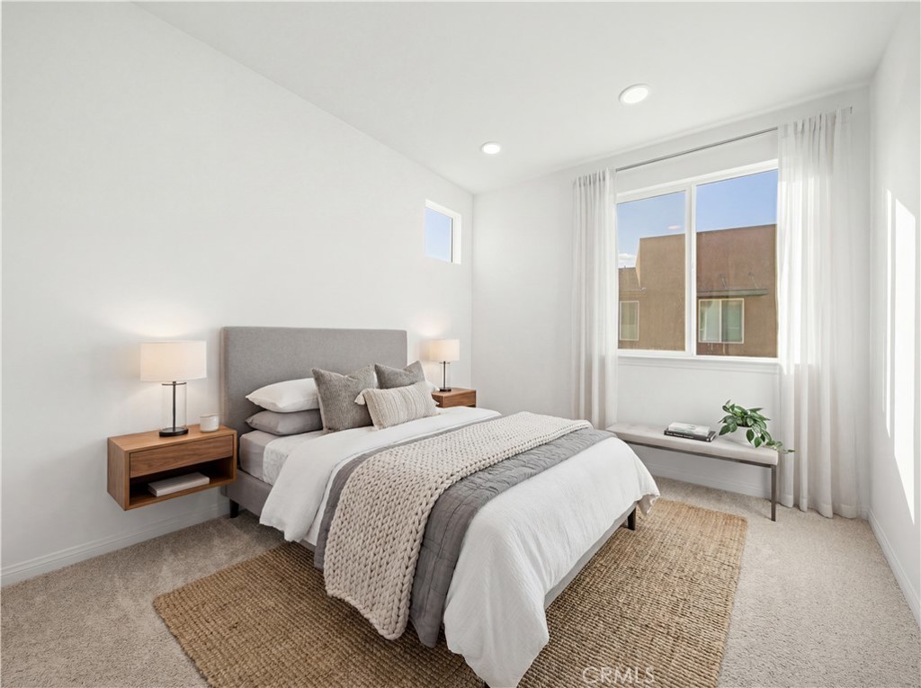 7803 Paxton Place Rancho Cucamonga, CA 91730 - Photo 5 of 44 a bedroom with bed and a night stand