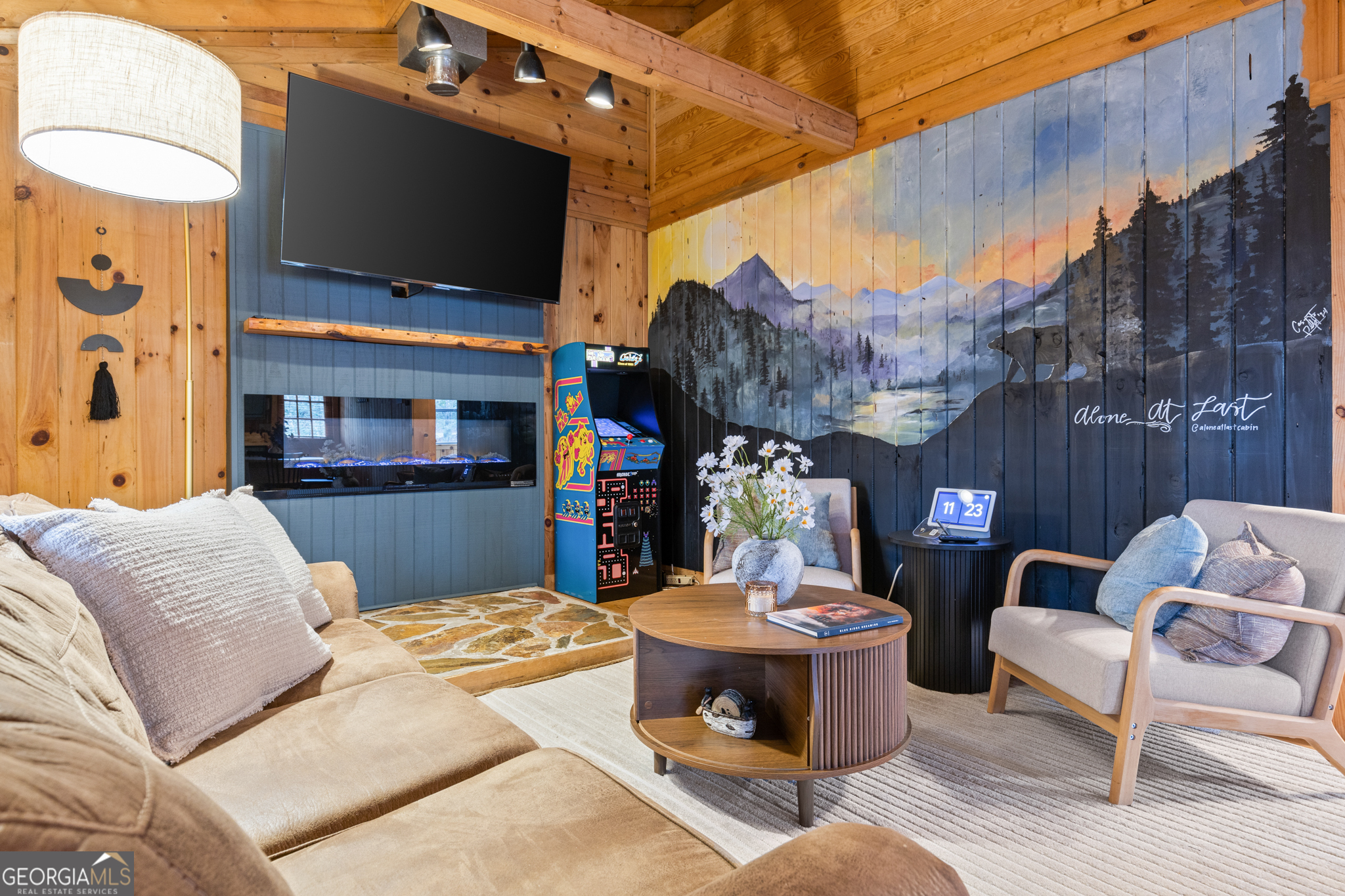 222 Icy Lane Blue Ridge, GA 30513 - Photo 12 of 37 a living room with furniture and a flat screen tv