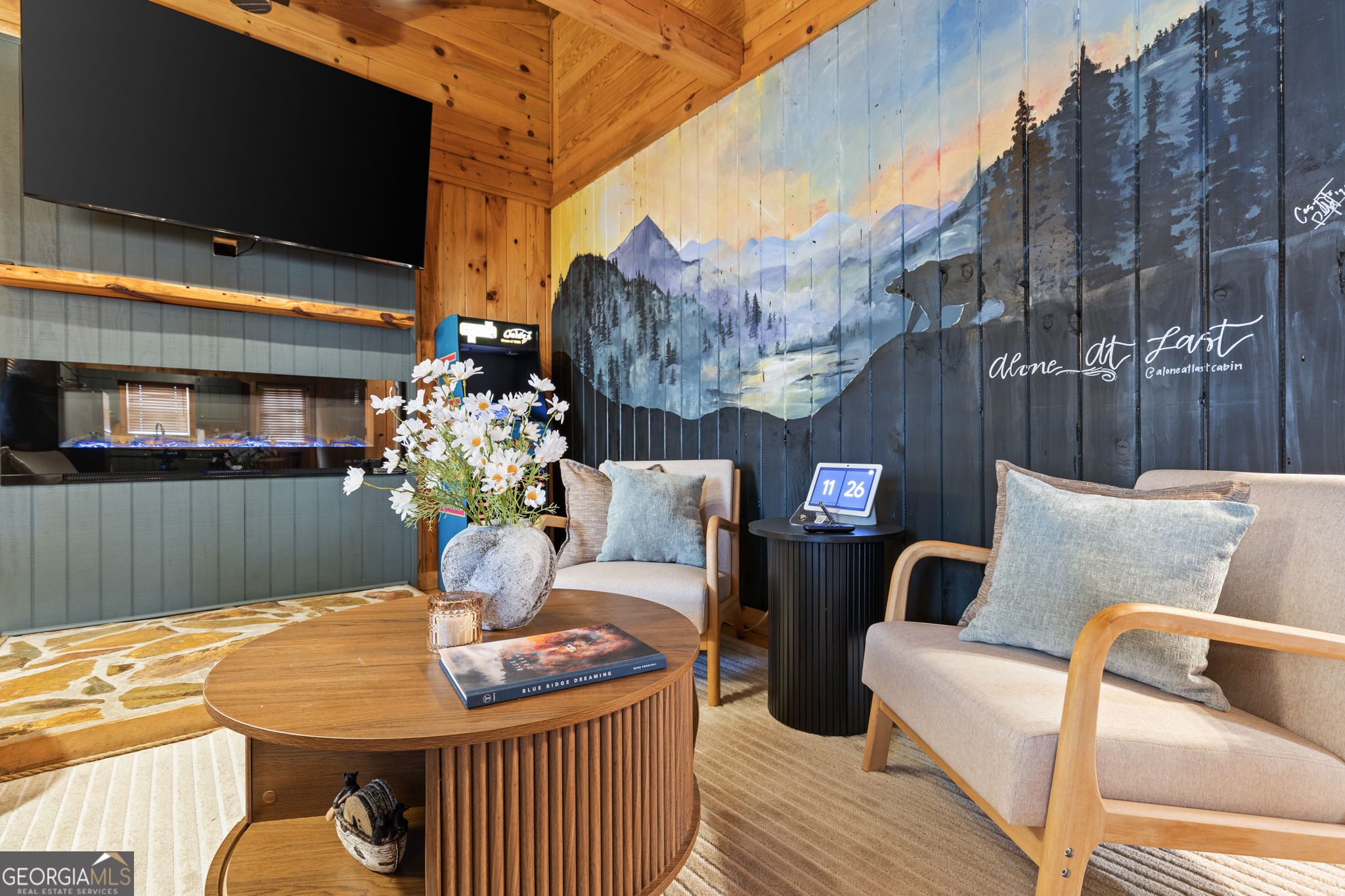 222 Icy Lane Blue Ridge, GA 30513 - Photo 14 of 37 a view of a couches and a tables in the patio