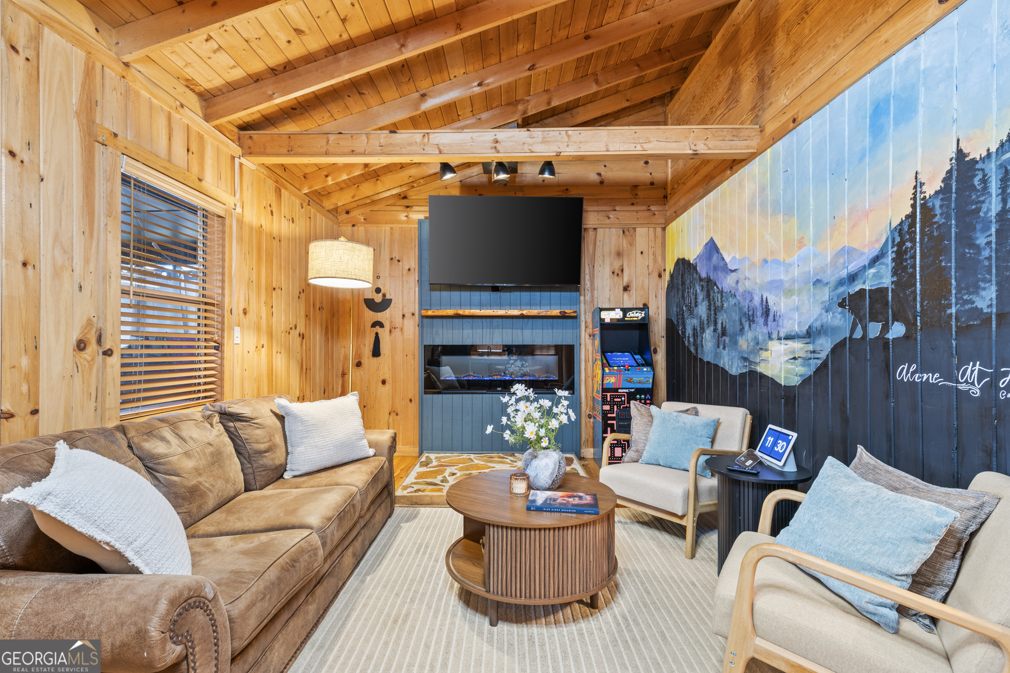 222 Icy Lane Blue Ridge, GA 30513 - Photo 17 of 37 a living room with furniture and a fireplace
