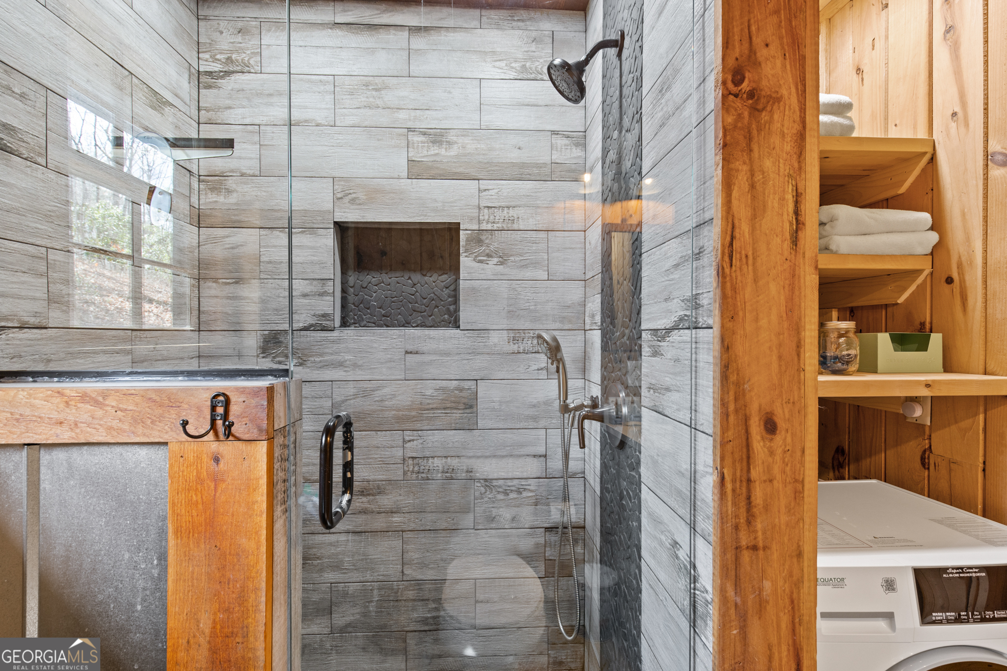 222 Icy Lane Blue Ridge, GA 30513 - Photo 26 of 37 a bathroom with a shower and a sink