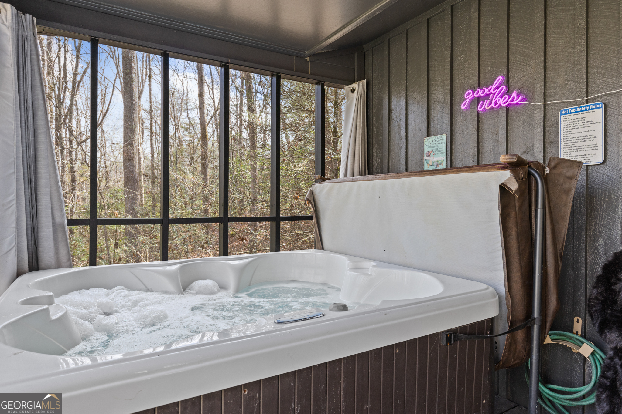 222 Icy Lane Blue Ridge, GA 30513 - Photo 33 of 37 a bath tub sitting in a kitchen next to a window