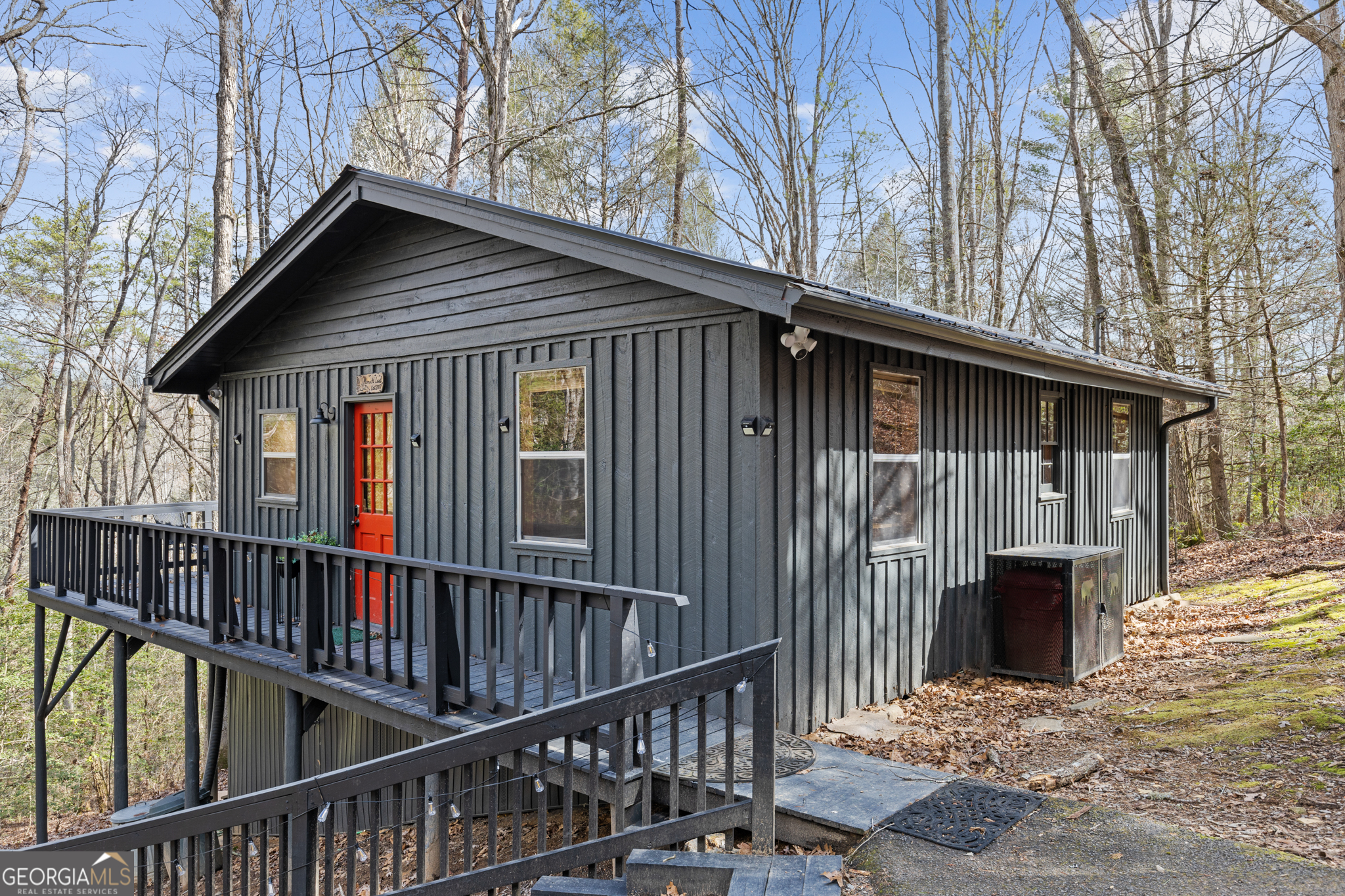 222 Icy Lane Blue Ridge, GA 30513 - Photo 5 of 37 a view of house with a deck and furniture